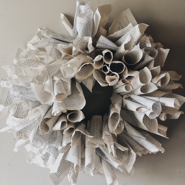 Close up view of book page wreath.