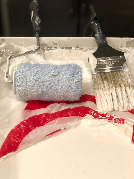 Money and time saver tip: Reuse a store plastic sack to line your paint tray. Prevents having to wash tray between coats and free.