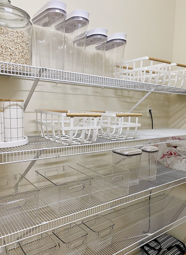 wire shelving holding pantry organizational containers