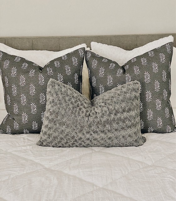Coordinated throw pillows on bed