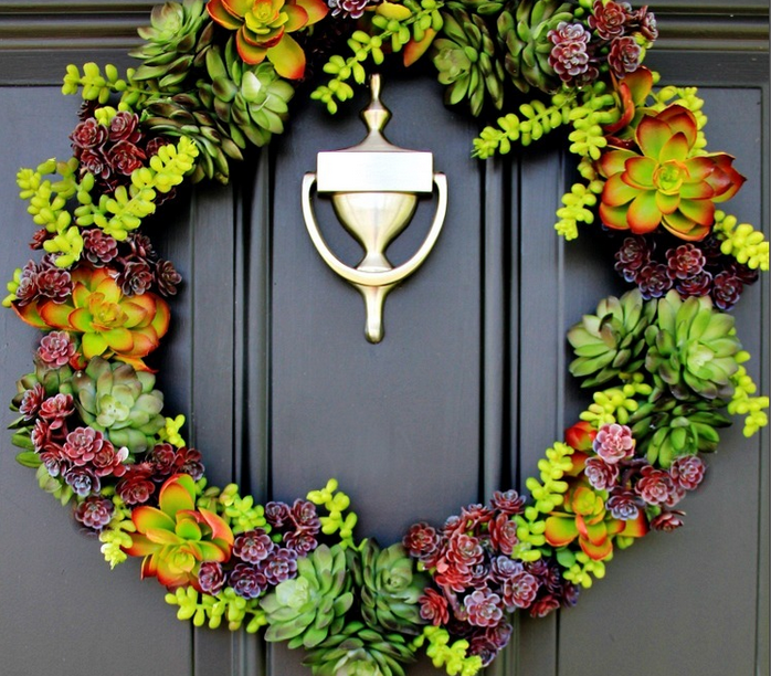 7 Rustic Farmhouse Wreath Ideas for your Summer Front Porch featured by top AL home blogger, She Gave It A Go | Farmhouse Wreath Ideas by popular Alabama life and style blog, She Gave It A Go: image of a faux succulent wreath. 
