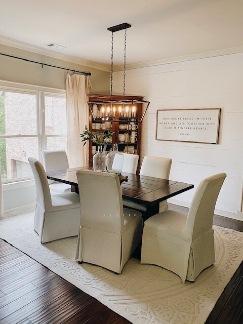 5 Shiplap Wall Ideas featured by top AL home decor blogger, She Gave It A Go | Shiplap Wall Ideas by popular Alabama life and style blog, She Gave It A Go: image of a dining room with white shiplap walls. 