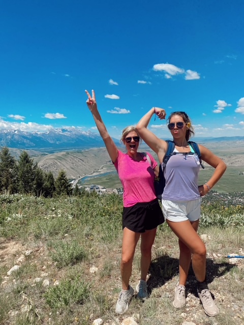 7 Best Things to Do in Jackson Hole with Teens featured by top AL family blogger, She Gave It A Go | Best Things to do in Jackson Hole by popular Alabama travel blog, She Gave it a Go: image of two women hiking in the mountains. 
