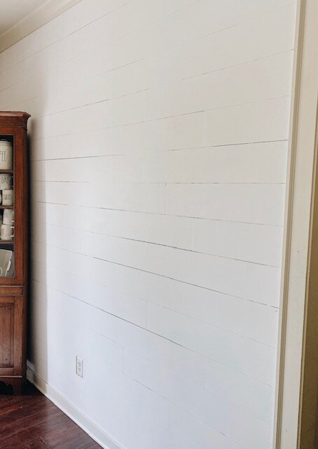 5 Shiplap Wall Ideas featured by top AL home decor blogger, She Gave It A Go | Shiplap Wall Ideas by popular Alabama life and style blog, She Gave It A Go: image of a white shiplap wall. 