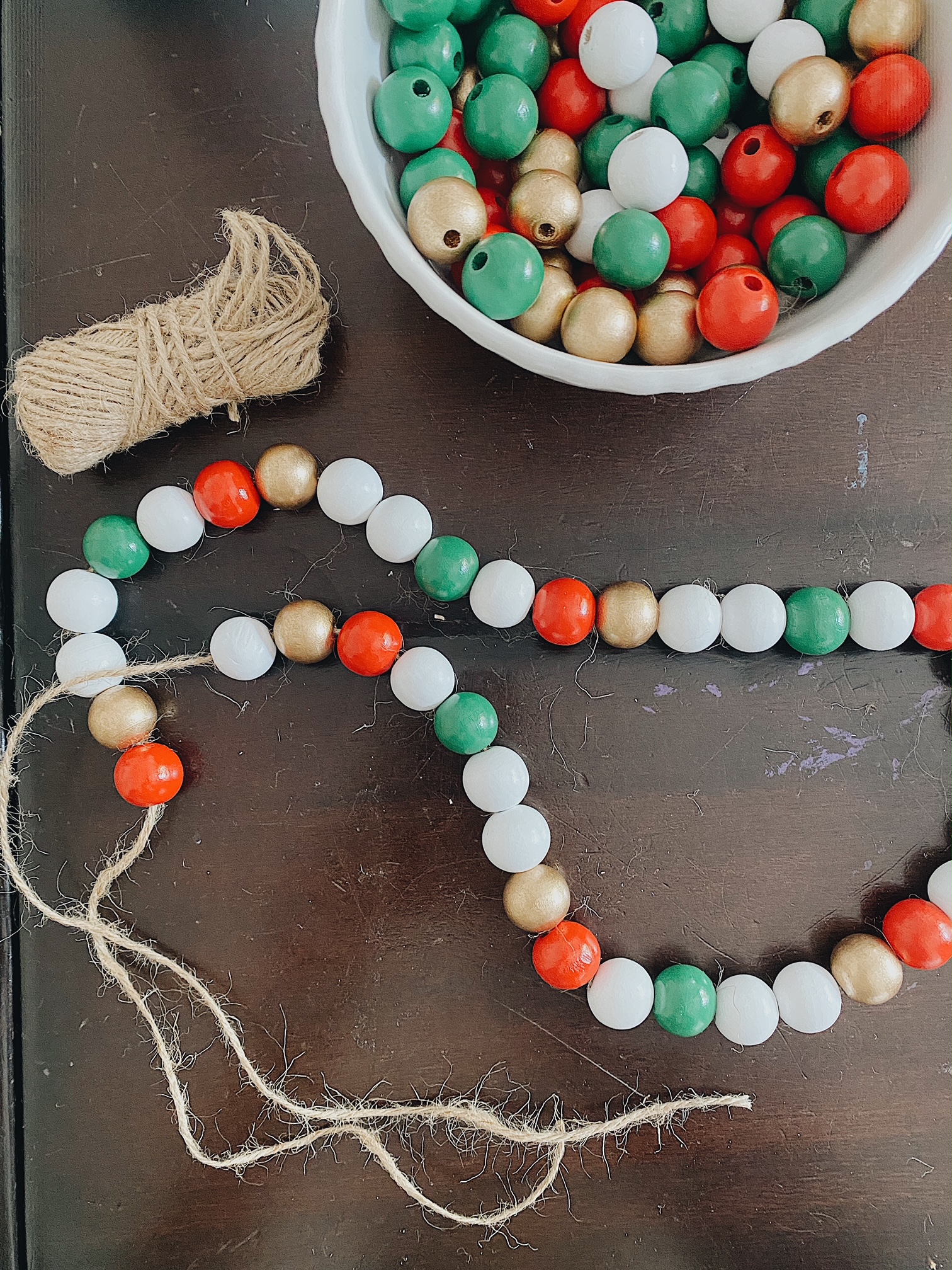 How to Make a Christmas Wood Bead Garland, a Christmas craft tutorial featured by top AL home blogger, She Gave It A Go