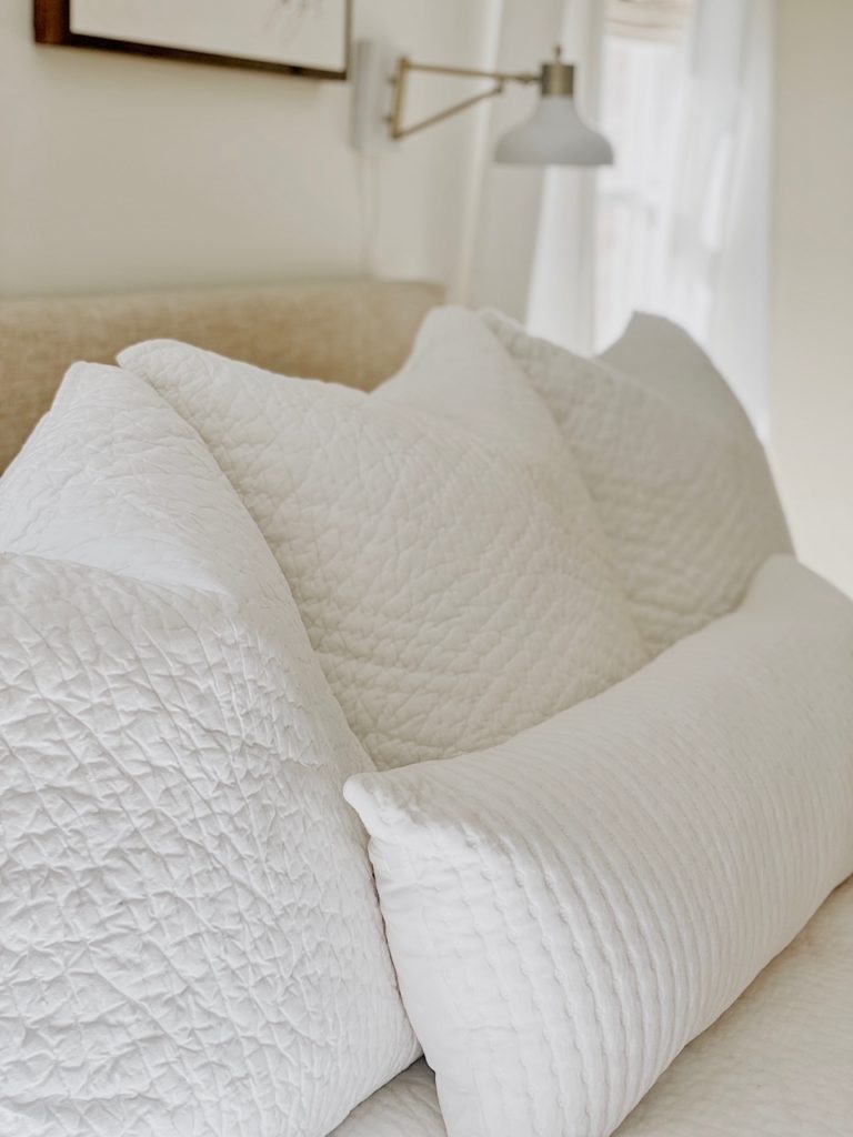 white square euro pillows with white shams