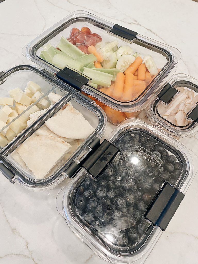 vegetables and fruits inside food storage containers