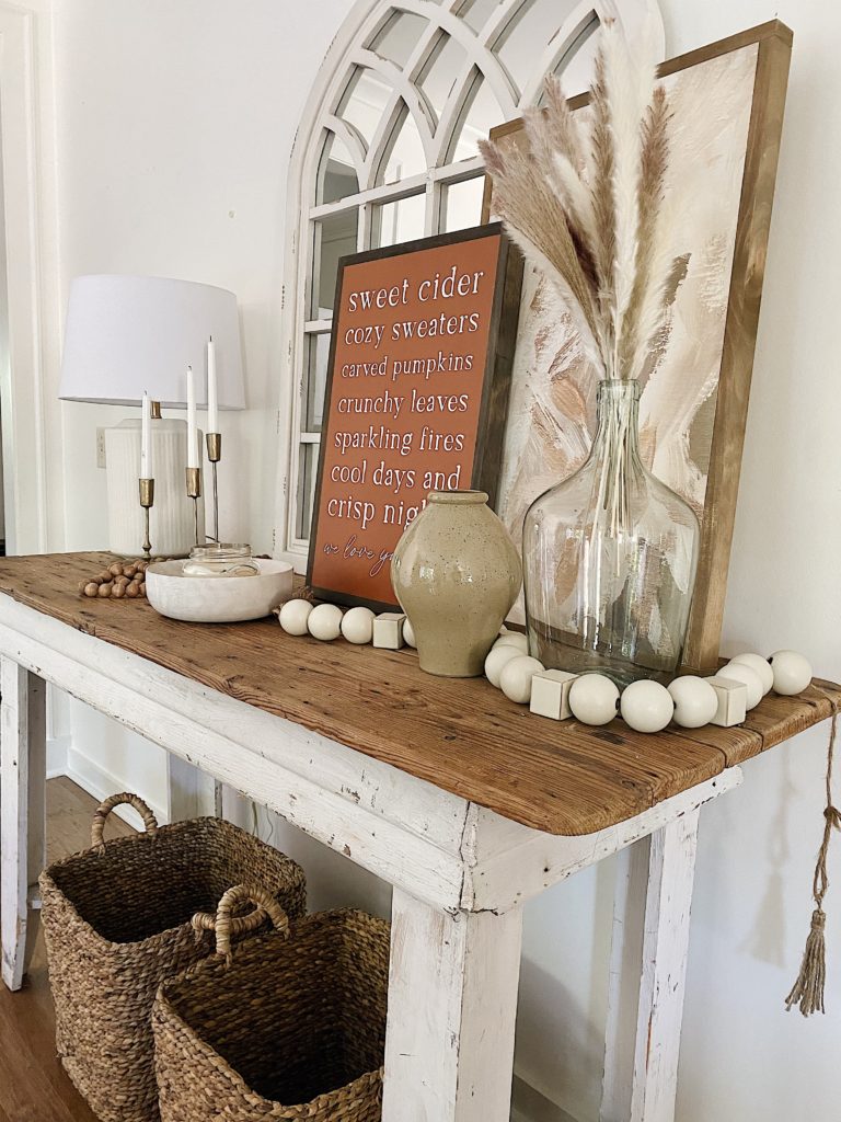 rustic farmhouse style console table decorated for fall