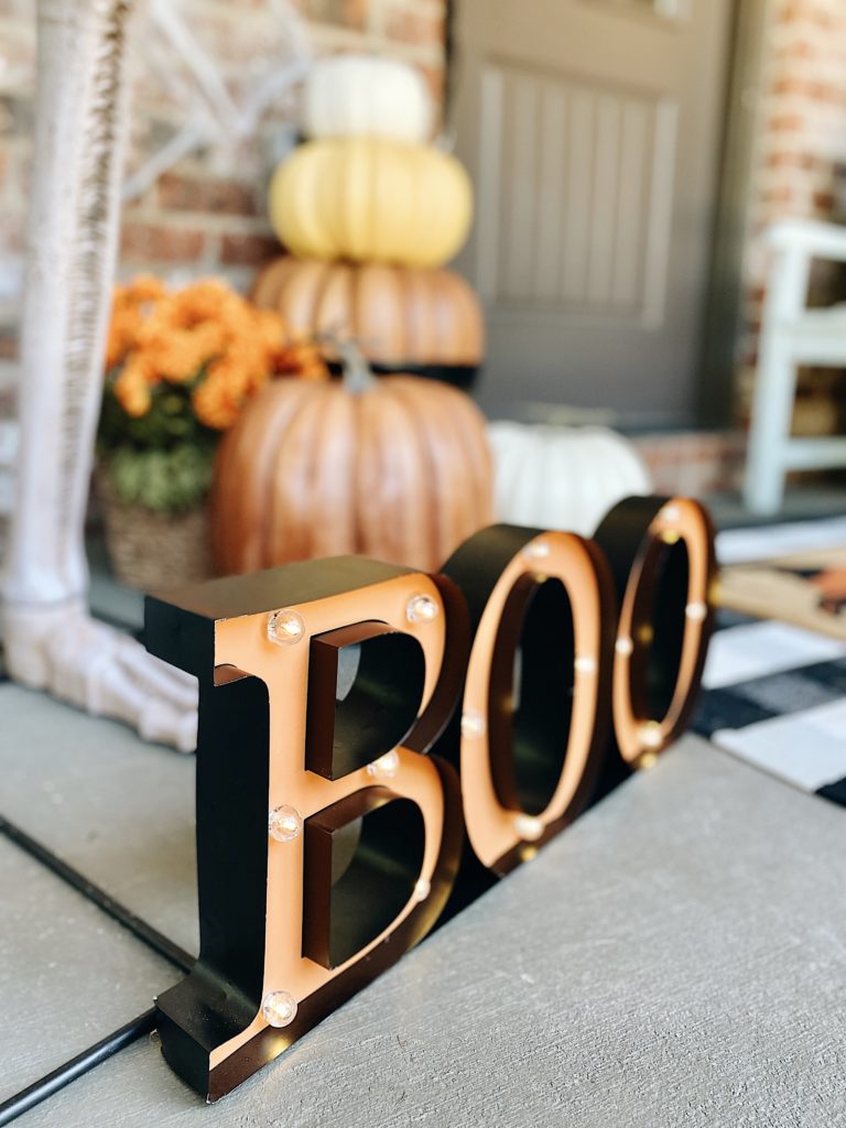 Halloween front porch decor with Boo sign