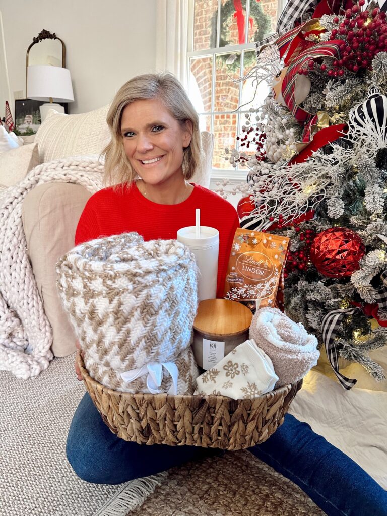 She Gave It A Go holding the Cozy Christmas Gift Basket from JOANN