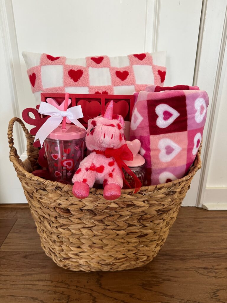 basket full of Valentine's Day decor and goodies 