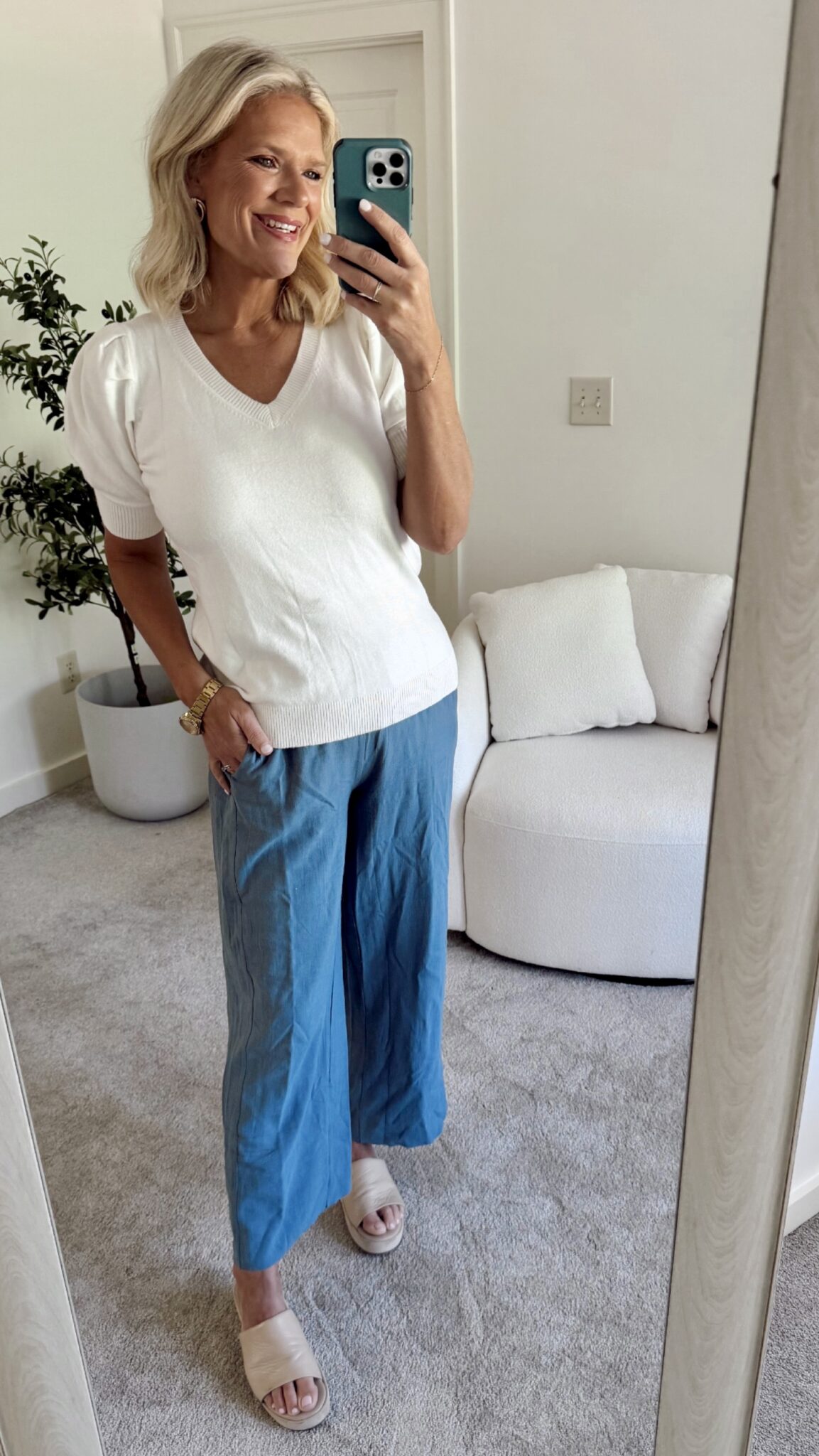 A summer outfit featuring linen pants for comfort and a puff sleeve top for a stylish, everyday look