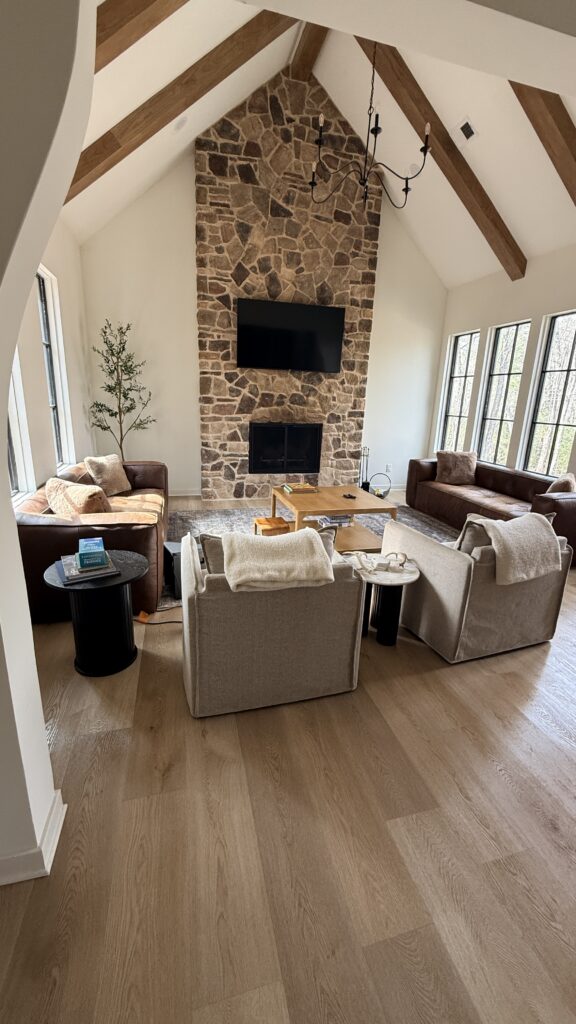 Cozy stone fireplace living room at Sequoyah Ridge House Highlands NC